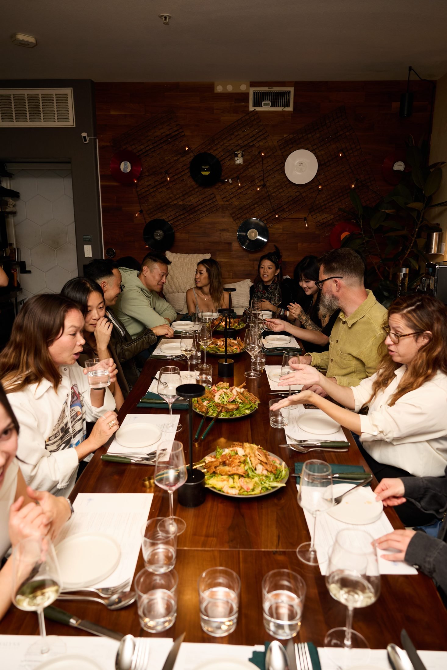 The table mid-dinner — supper club energy